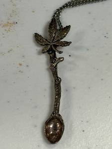 lot 33 image: Vintage Sterling silver marijuanna necklace pendant