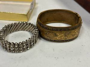 lot 39 image: Vintage cuff bracelet, British Hong Kong stretch bracelet