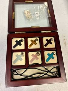 lot 41 image: Changable pendant necklace, with 6 stone crosses, and chain, in wooden box