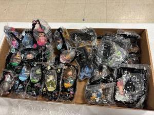 lot 65 image: Box lot- Walt Disney, McDonald��s, happy celebration on earth, madame Alexander dolls, wizard of oz, buzz light year