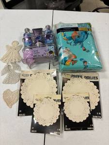 lot 91 image: misc lot- table cloth, shower gel kit, paper doilies