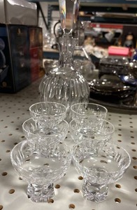 lot 122 image: Crystal decanter with cordial footed glasses