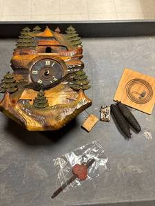 lot 132 image: vintage made in Germany, cuckoo clock, cabin in the wood style