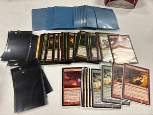 lot 141 image: magic of the gathering cards 2012-2013 in yellow ultra pro deck box