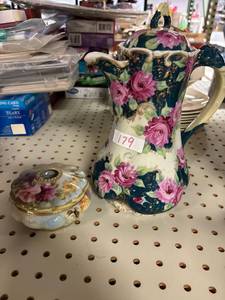 lot 179 image: Vintage Chocolate pot, and hair catcher, both have damage