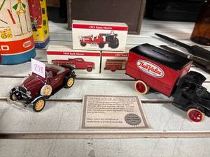 lot 298 image: ERTL Mack true value 1926 bulldog coin bank, china made ford model A car, 3- 1999 readers digest fire engines