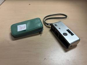 lot 302 image: Minolta 16 Model P 16mm subminiature camera, with case