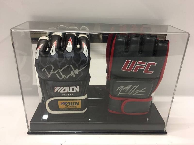 lot 81 image: UFC MATT HUGHES AND DAN HENDERSON UFC FIGHTERS AUTOGRAPHED GLOVES  BOTH HAVE CERTIFICATE OF AUTHENTICITY