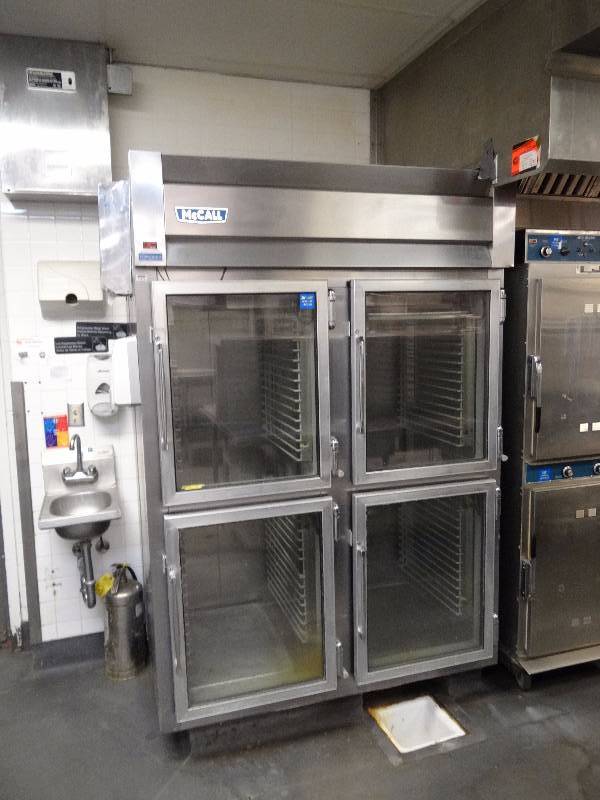 lot 644 image: McCall (4) Door Reach In Refrigerator