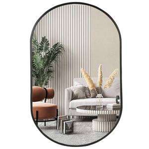lot 61588 image: Jenbely Black Oval Mirror, 17in x 30in