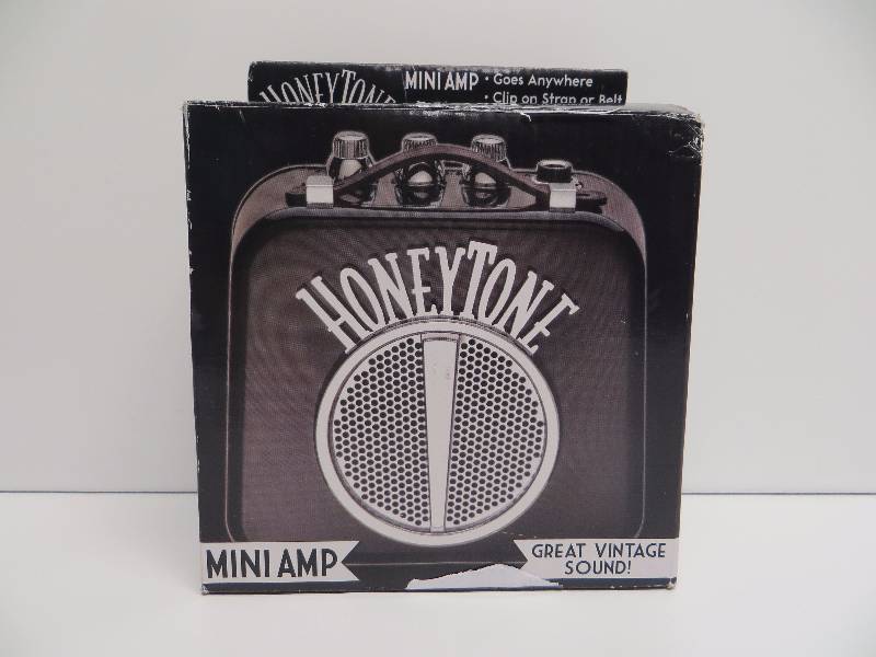 lot 2328 image: Honey tone mini amp