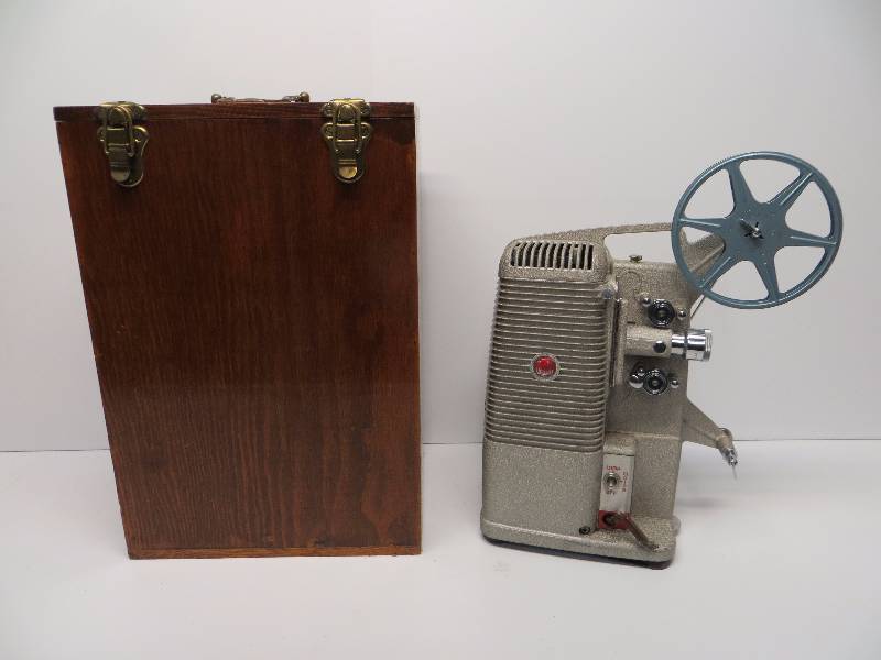 lot 2383 image: Vintage DeJUR projector with wood box