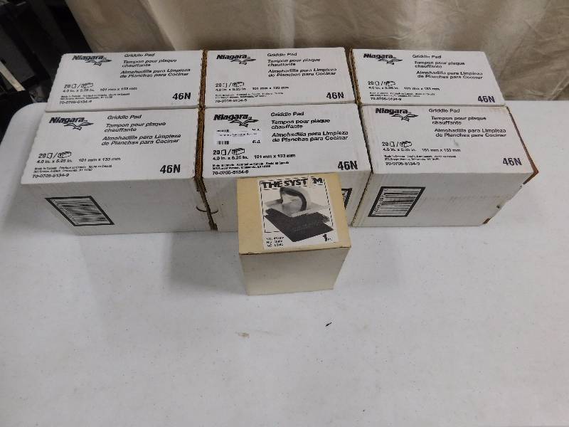 lot 64 image: Lot of Niagara Scouring Pads and The System Handle