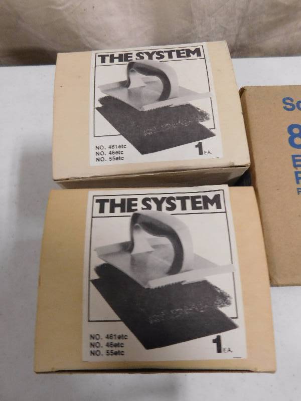 lot 84 image: Lot of The System Pad Holder and Scotch Bright Pad Holders