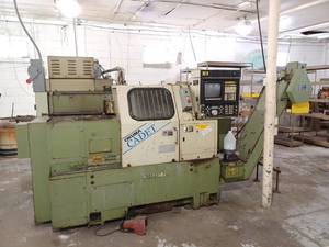lot 12 image: Okuma Cadet LNC-8 CNC Lathe, 9,500 lbs - SEE Video