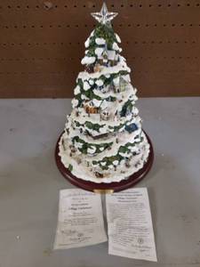 lot 437 image: 14 tall Thomas Kinkade Motion Village Christmas Tree Musical w COA