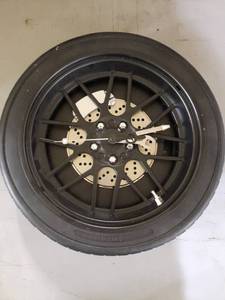 lot 461 image: Battery Operated Car Wheel Shop Clock 14