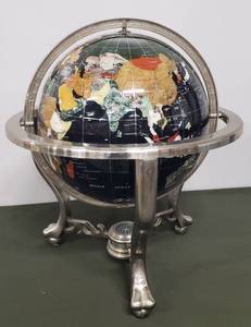 lot 1 image: Large World Globe with Cut Semi Precious Stones covering surface - 12 Inch W -  on Ornate Silver Tone Die Cast Stand with Compass set in Base - Fully Spins & Rotates - 18 W x 19 T - Excellent Show Piece Condition
