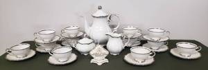 lot 14 image: Vintage MITTERTEICH Bavaria China - Platinum Princess Pattern - Coffee Service - Coffee Pot, Cream & Sugar, 12 CupSaucer Sets, & Porcelain Dealer Counter Display Plaque