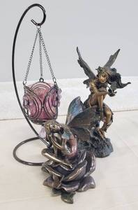 lot 21 image: Top Collection -  2 Bronze Tone Resinstone Garden Fairy Figurines & a Hanging Pink Glass Votive Lamp with Metal FrameHolder