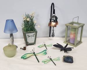 lot 22 image: Dragonfly Decor - 3pc Whirly-gig, Planter with Faux Floral Plant, Pottery Rattle & Cast Iron Shelf Sitter - Candle Lantern with Candle, Lidded Candle Jar, Glass Shade Votive Lamp, & Copper Windchime Bells (Yard Stake Hook Not included)