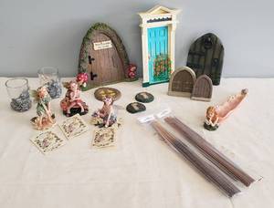 lot 34 image: Collectible Gnome Decor & Variety of Fairy Doorways to Middle Earth, 3pc Set pf Faeriessence Figurines by the Boyd Collection, Pewter Votive Cups, and Resin Fairy Incense Holder with 4 packs of Sticks