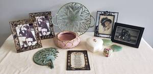lot 38 image: Metal Garden Basket, Verdi Metal Sun Wall Candle Sconce, New Photo Frames, Porcelain & Ceramic Heart Dresser Boxes, Cut Jade Heart Paperweights, Pink Pottery Planter, & Children Live What They Learn Poem on Glass Sun Catcher