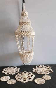 lot 40 image: Vintage Shell Art - Hanging LanternPlant Holder,  Shell Pot HoldersTrivets and 3 Coasters