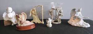 lot 47 image: Seraphim Classic Angel of Mercy Music Box, Resin Angel Chime, Porcelain Bisque Angel Night Light Lamp, Cherub Angel Vase, Porcelain Cherub Pill Box, & Ceramic Cherub Shelf Sitter