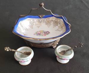 lot 63 image: Antique Pair of Hand Painted Porcelain Place Setting Salt Cellar Cups with Dipping Spoons - Stamped Italy, and O.P. Co. Syracuse China #G-11 Hand Painted Porcelain Tidbit Tray with 22K Gold Embellishment Trim made in USA - in Ornate Metal Caddy