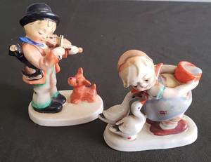 lot 69 image: Vintage Porcelain Hummel Style Children Figurines - Girl with Geese & Water Bucket is Stamped Occupied Japan 4.25in T, Boy with Violin & Puppy is marked Japan 5in T
