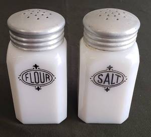 lot 73 image: Vintage HAZEL ATLAS Milk Glass Art Deco Design Kitchen Shakers - Salt & Flour - 2.5in x 2.5in x 5in T