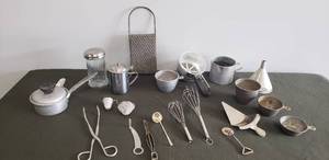 lot 82 image: Large Collection of Vintage Kitchen Tools, & Cooking Utensils - Whisks, Sifter, Tea Steepers, Grater, Metal Measuring Cups, Funnel, Sauce Pan, Pie Server, Tongs, Glass Sugar Shaker