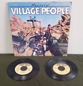 lot 101 image: Vintage VILLAGE PEOPLE - Cruisin 1978 Album - in Original Sleeve & 2 Village People 45 Records In the NavyManhattan Woman, & Y.M.C.A.The Women