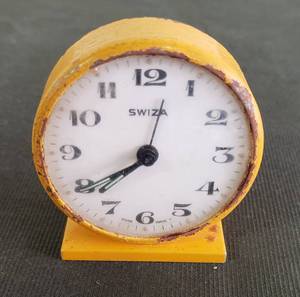 lot 107 image: Vintage SWIZA Swiss Made Heavy Wind Up Mini Alarm Clock - Yellow Metal Case - 2.25in x 2.25in - Works