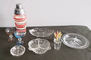 lot 116 image: Vintage Anchor Hocking Art Deco 48oz. Glass Cocktail ShakerMixer with Banded Rings - Metal Lid & SpoutStrainer, Colored Glass Cocktail Stems, Divided Nut Dishes, Pressed Glass Ashtray, Bauer & Black Measuring Jigger, & Cocktail Spears in Shot Glass