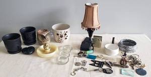 lot 125 image: Vintage Metal Lamp, Transistor Radio with Case, Pottery Trinket Catchers, Old KeysBottle Openers, Old Glass Furniture Caster Cups, Planters, Carved Black Marble Heart Paperweight, Owl Wax Melt Lamp, & Carved Onyx Owl Dresser TrayAshtray