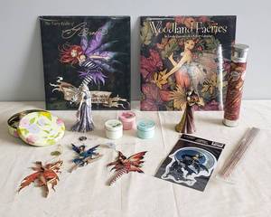 lot 129 image: Dragonsite Collection Summer Dreams & Winter Fantasia, Calgon Mini Candles, Fairy Stickers NIP, 3 Fairy Illusions Ornaments, NIP Incense, Floral Tin with Ornaments, Woodland Faeries 2007 Calendar NIP, I Do Beleive in Faeries 2008 Calendar NIP