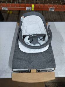 lot 2307 image: Joy & Lotus Baby Bouncer
