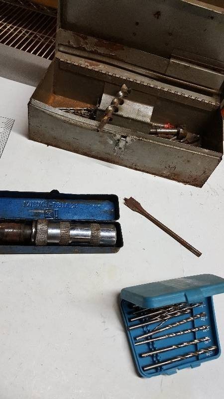 lot 5914 image: Metal Toolbox with multiple drill bits and a Impact Driver