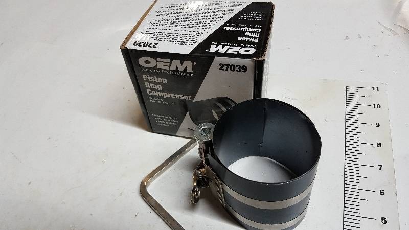 lot 5812 image: OEM Piston Ring Compressor # 27039 2 18-5 Looks to be new in the box
