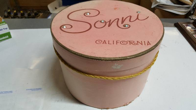 lot 5832 image: Sonni Vintage hat box that has some bling to it
