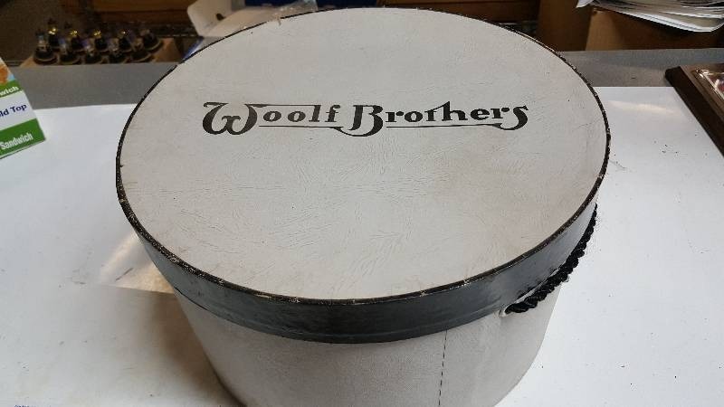 lot 5833 image: Woolf Brothers vintage hat box. Black and White in color