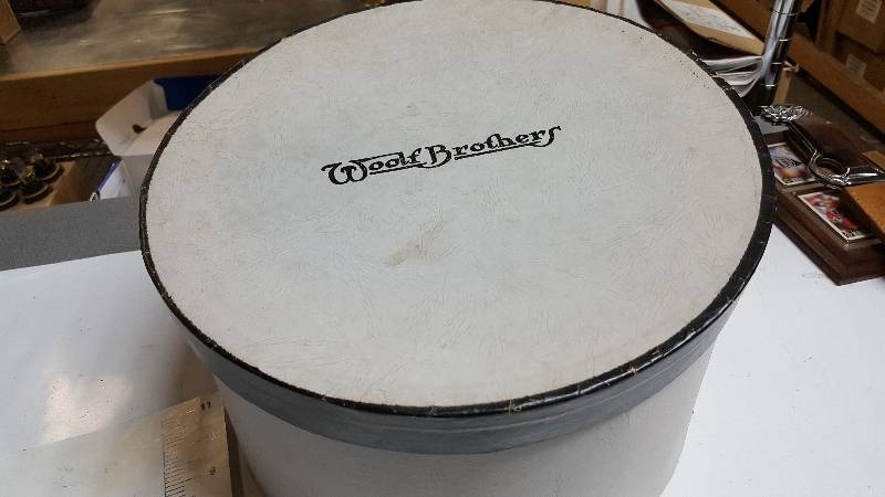 lot 5835 image: Vintage Woolf Brothers hat box.