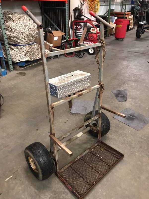 lot 73 image: VERY LARGE WELDING CART WITH ALUMINUM STORAGE BOX AND GOLF CART TIRES