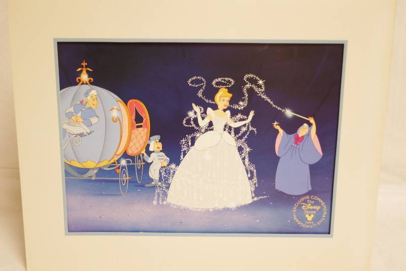 lot 1052 image: Walt Disneys Masterpiece - Cinderella Commemorative Lithograph Print - 1995 - In Dinsey Cardboard Frame - Print is in perfect condition