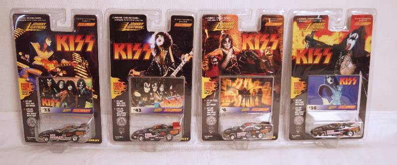 lot 2058 image: Lot of 4 - KISS Race Cars Johnny Lightning - NEW IN PACKAGES - Great for the collector