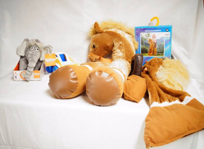 lot 2381 image: Plush Toys - Horse Costume, Horton by Dr Seuss (both NEW) and Tiny Tikes Tractor (nice needs cleaned to look new)