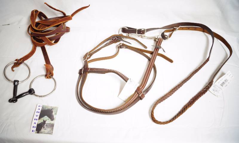 lot 2382 image: Horse Accessories - NEW Snaffle and Reins - See photos for sizes, measurements and details