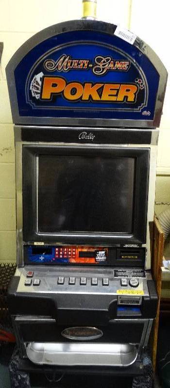 lot 9897 image: Multi game Poker arcade machine - Machine is about 5 foot tall